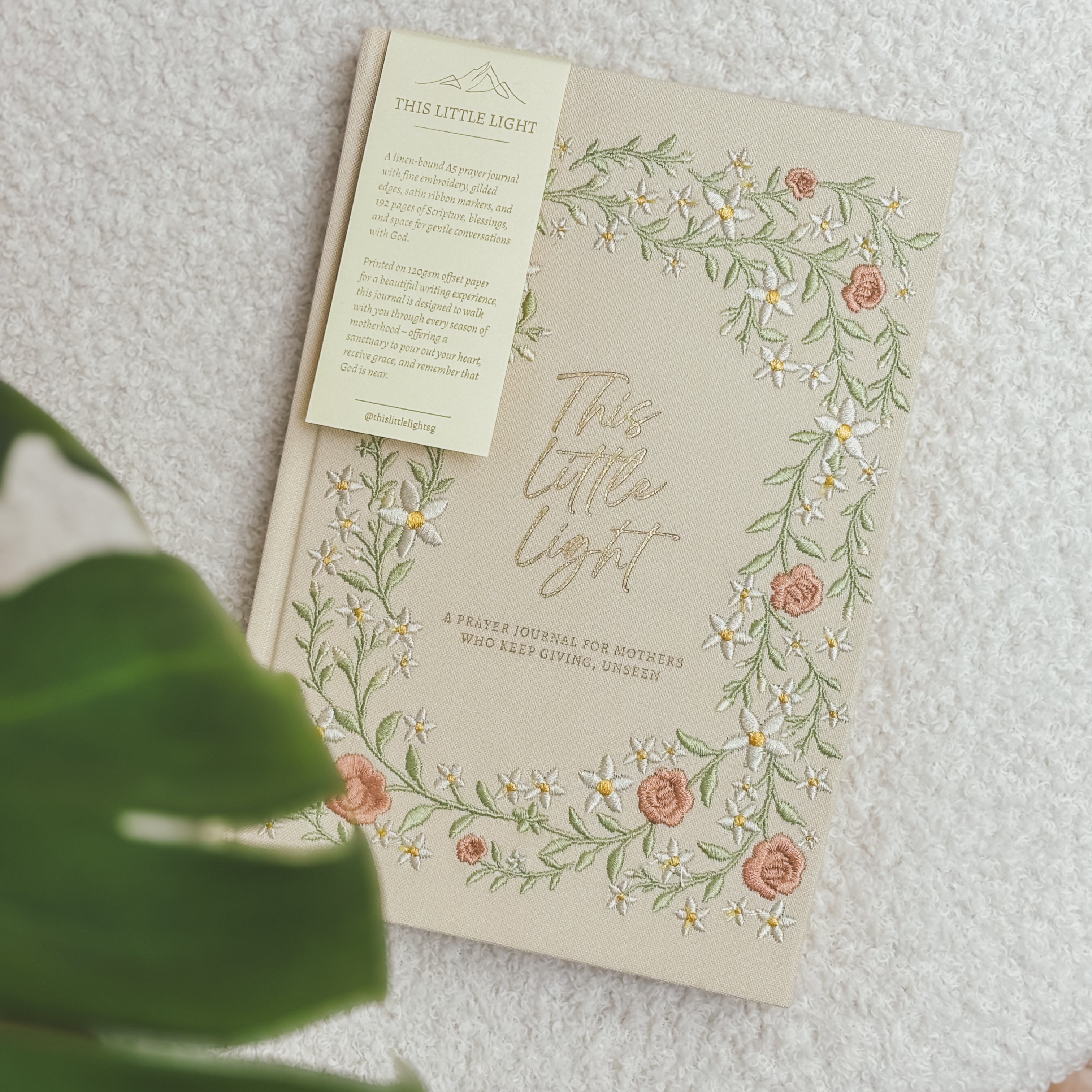This Little Light prayer journal for mothers with floral embroidered cover and bookmark tag