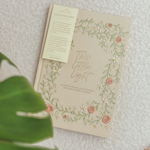 This Little Light prayer journal for mothers with floral embroidered cover and bookmark tag