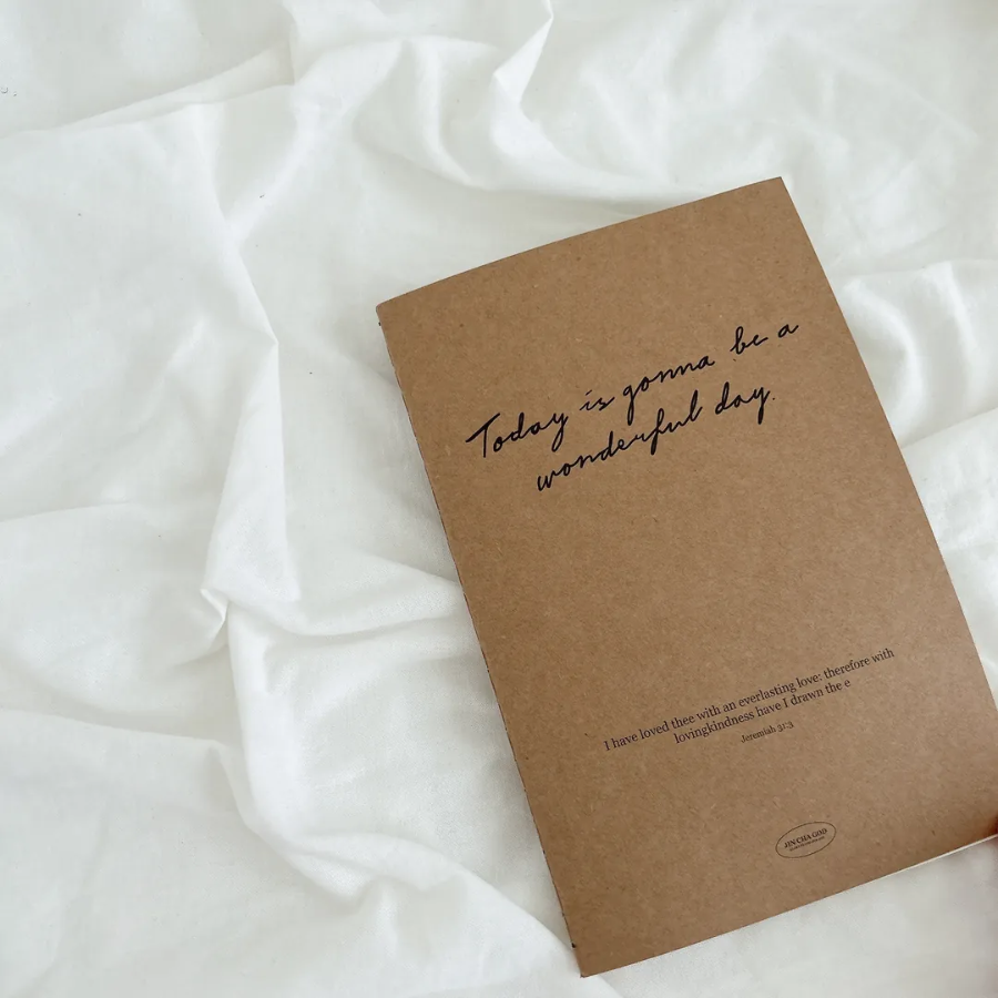 Today is gonna be a wonderful day A5 notebook with an uplifting message on a soft white fabric, inspiring simple happiness and positivity for everyday living.