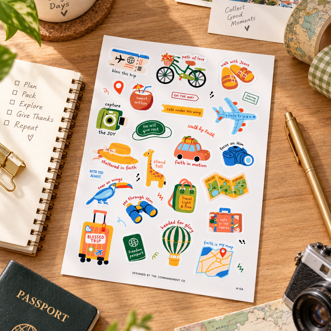 Travel Everyday Stickers sticker sheet styled on a wooden desk with a travel journal, passport and camera.