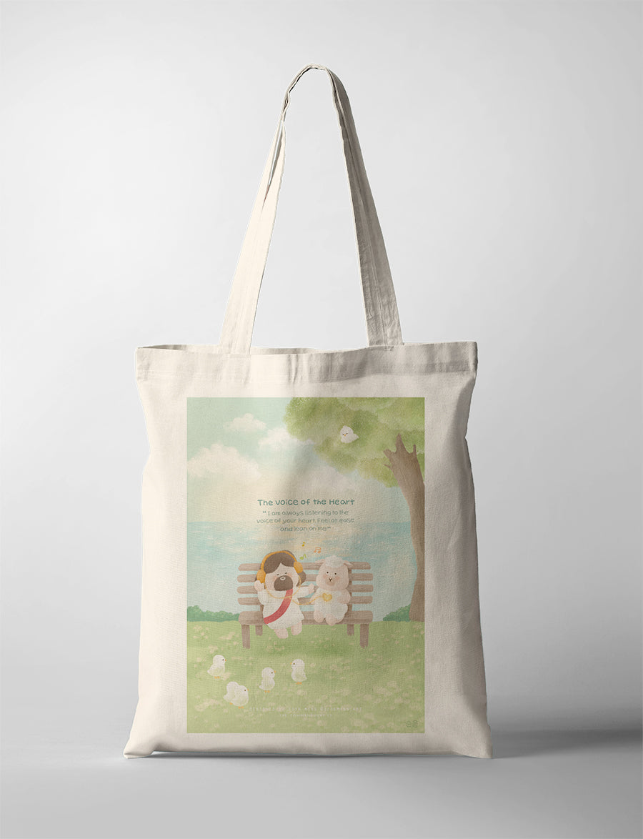 to the voice of the heart. The tote bag features the quote, 'I am always listening to the voice of your heart. Feel at ease and lean on me,' set against a serene outdoor background.