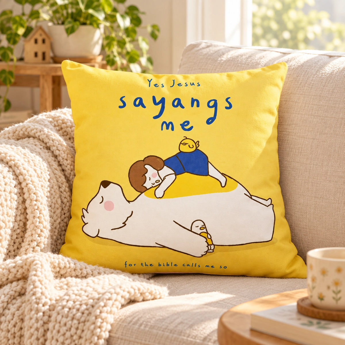 Yes Jesus sayangs me Christian cushion cover styled on a cosy sofa