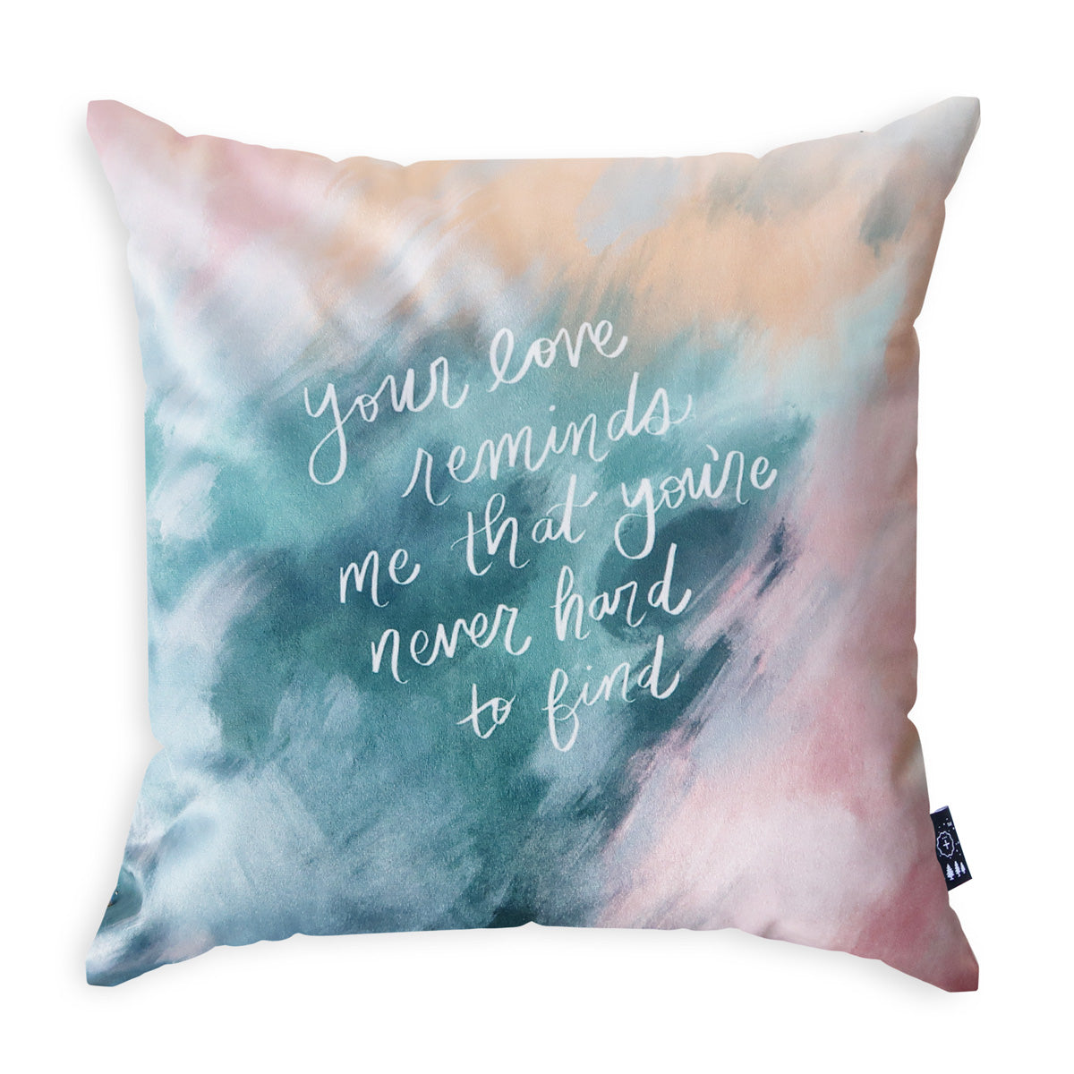 Decorative throw pillow featuring the text 'Your love reminds me that you're never hard to find,' designed with a pastel cloud-inspired aesthetic for Christian faith-based home decor.