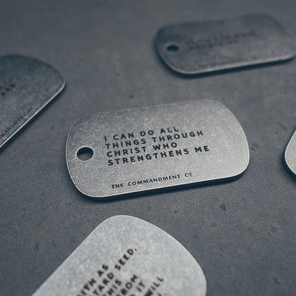 Gunmetal dog tag with custom engraving detail