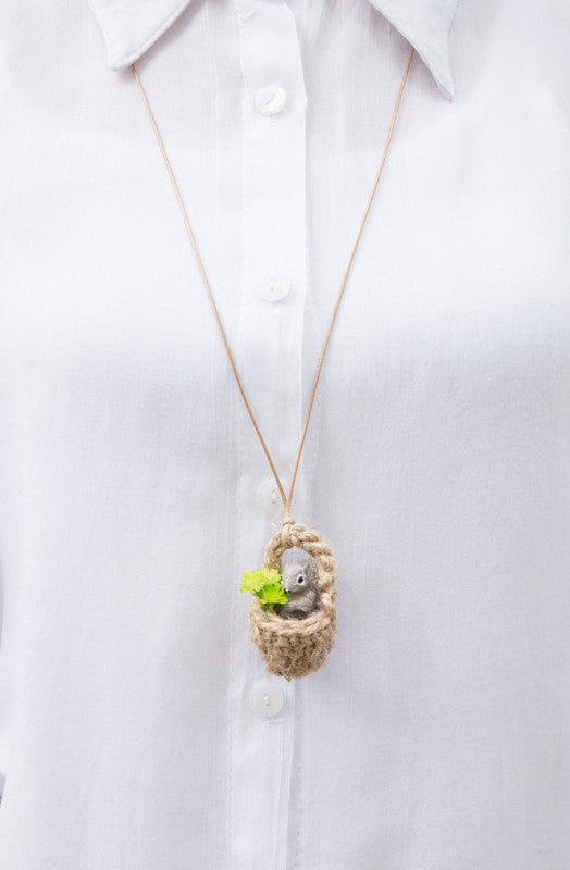 Long necklace with a squirrel pendant