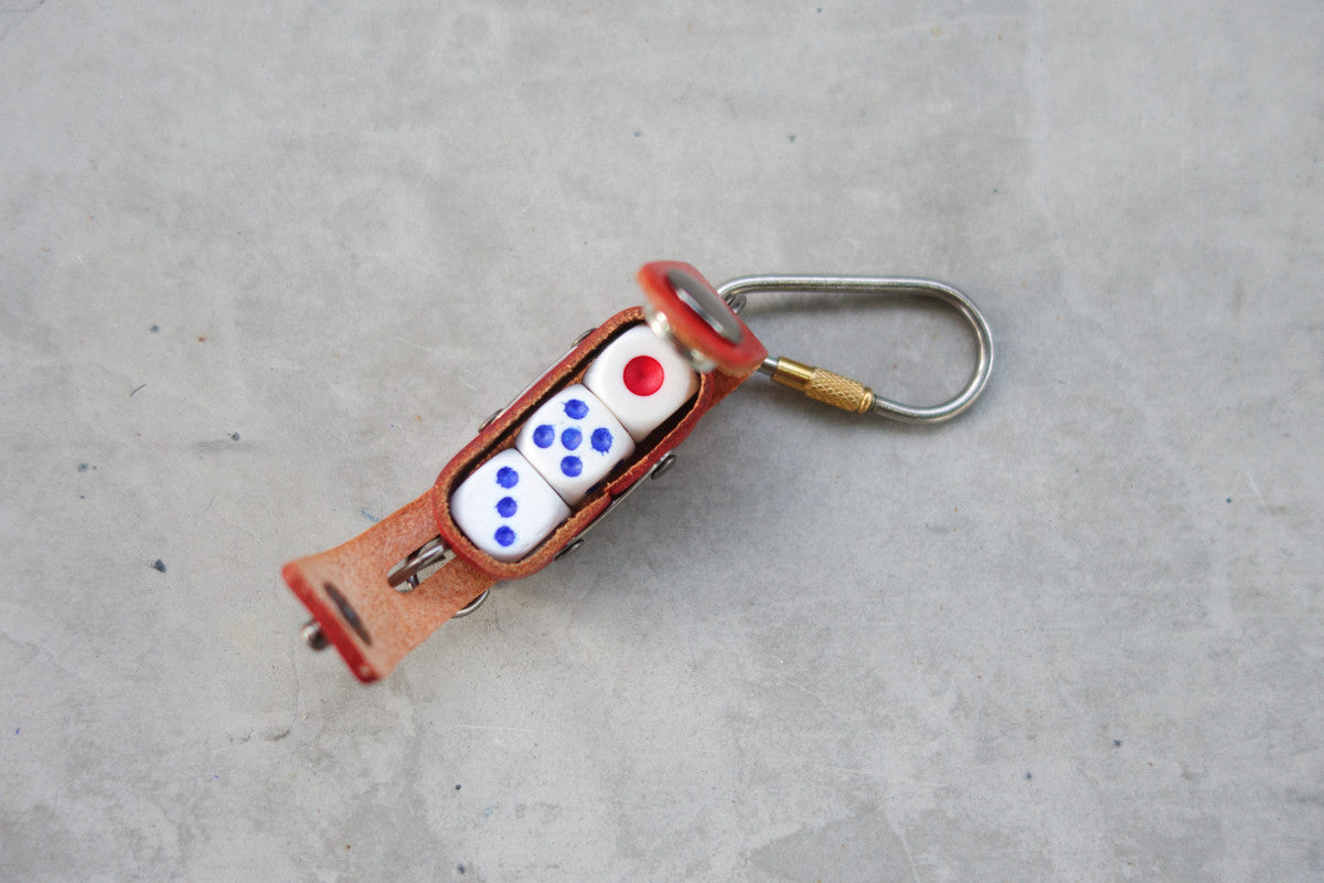 rectangular dice case can hold 3 dice