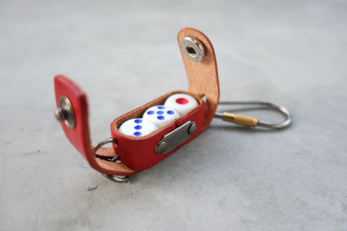 rectangular dice case can hold 3 dice