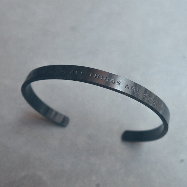 Gunmetal-black Christian Verse Band close-up by J&Co Foundry.