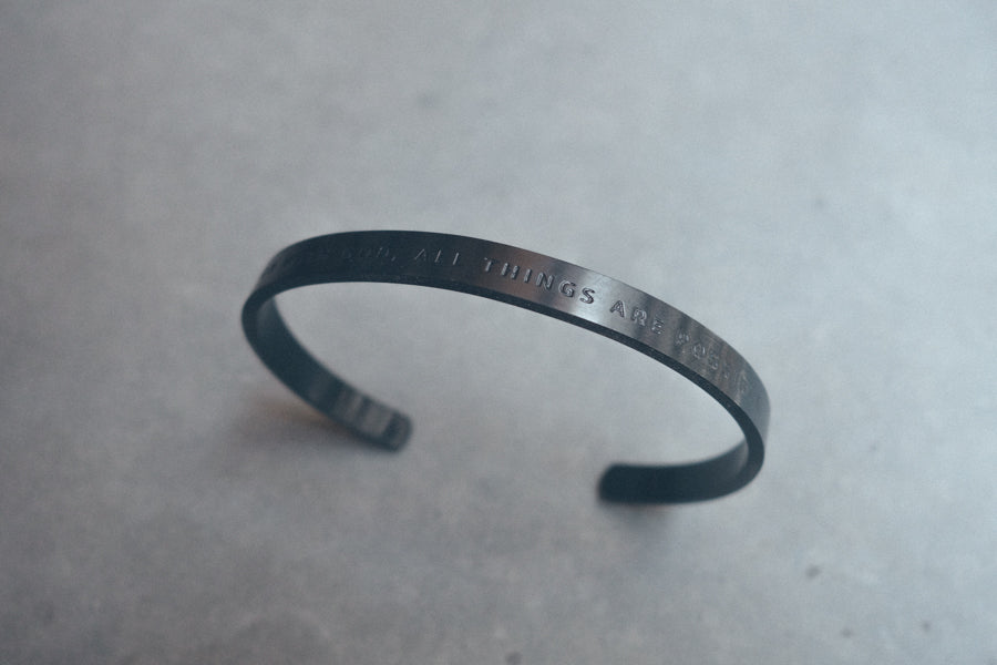 Gunmetal-black Christian Verse Band close-up by J&Co Foundry.