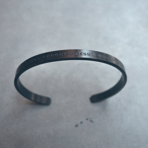 Black on Black Christian Verse Band worn on wrist.