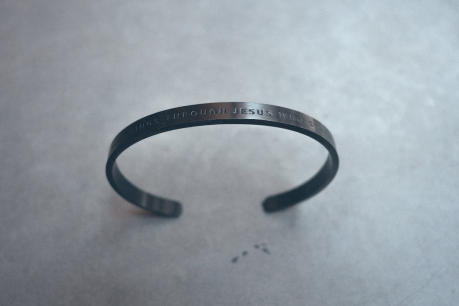 Black on Black Christian Verse Band worn on wrist.