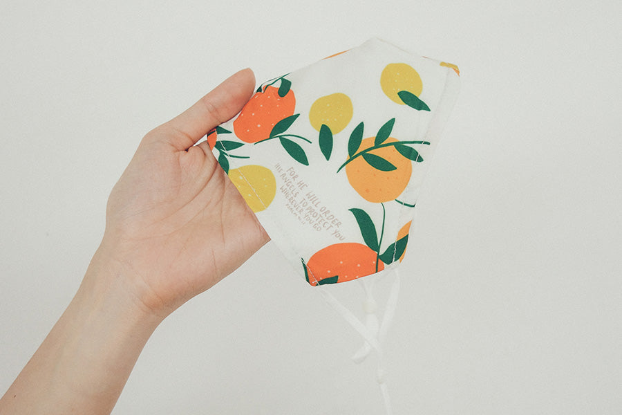 Lemon And Oranges - He Will Order His Angels {Face Mask} - Face Mask by The Commandment Co, The Commandment Co