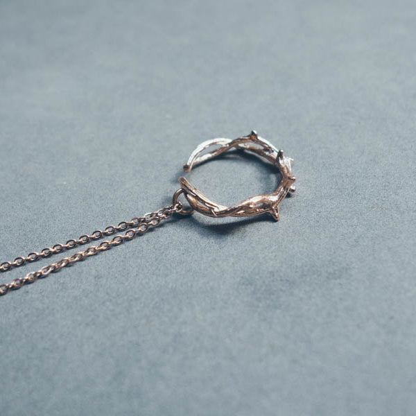 Rose Gold Crown of Thorns ring-style necklace pendant.