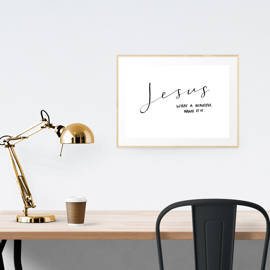 Minimalist Christian poster hung on a wall.