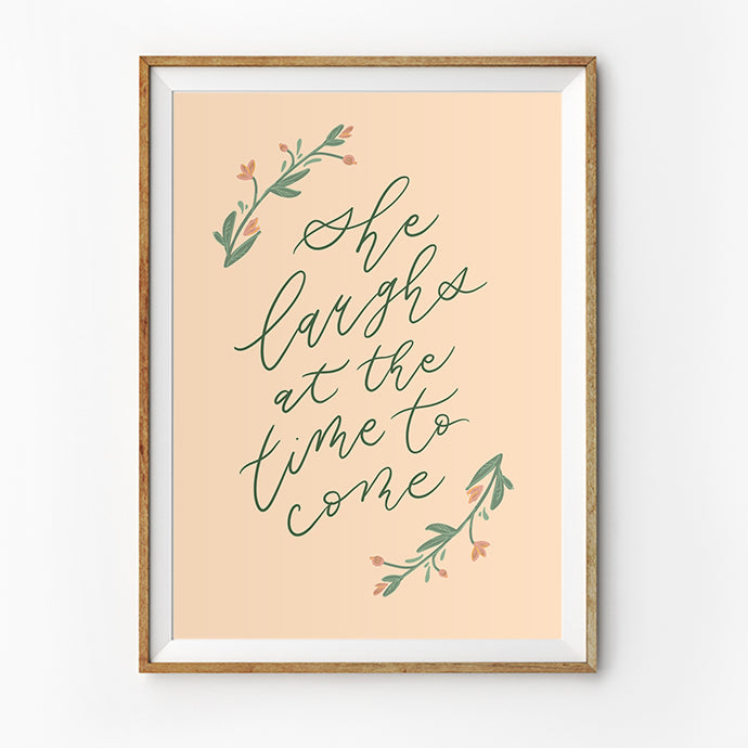 Posters featuring beautiful typography bible verses with flower designs. ‘She laughs at the time to come’. 200GSM paper, available in A3,A4 size.