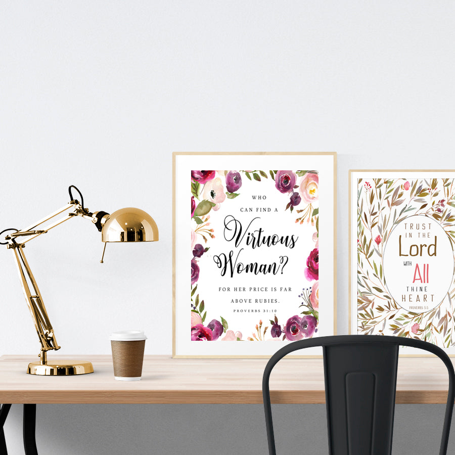 A3 beautiful calligraphy poster placed standing next to a smaller A4 sized calligraphy poster on a wooden table. Modern Christian home interior design ideas.