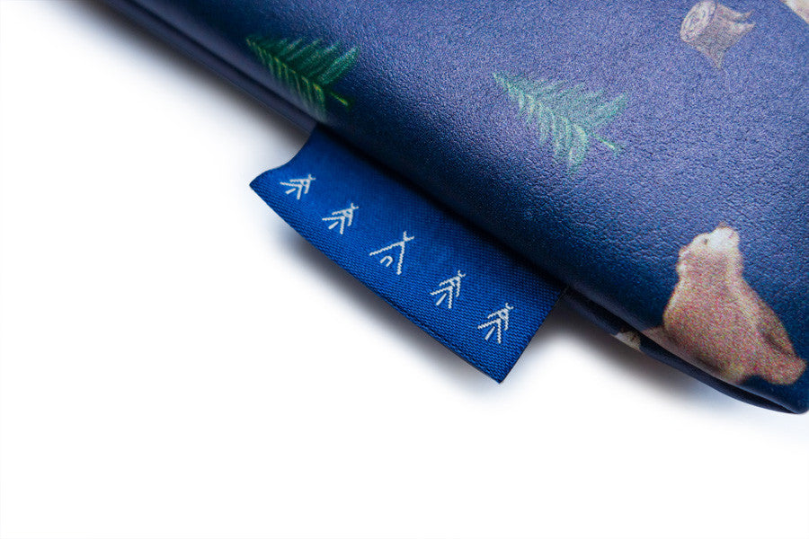 Be Strong & Courageous pouch detail with printed PU leather exterior.