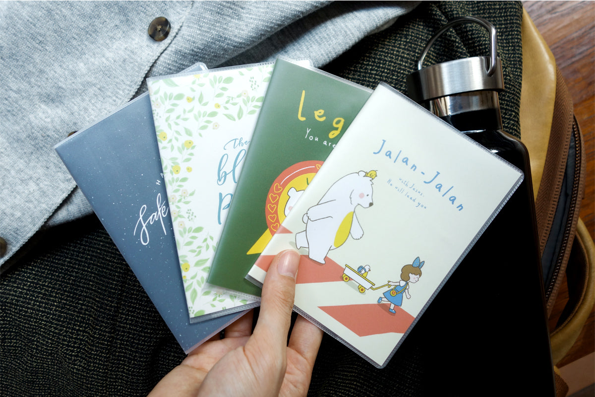 The Commandment Co passport cover collection including the Legit! You Are Loved! design.