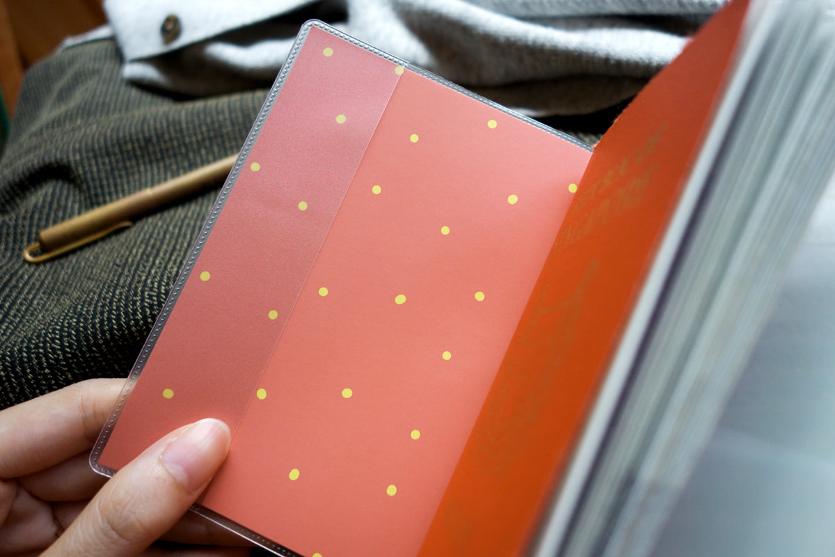 Jalan-Jalan With Jesus passport cover with colourful polka-dot travel design.