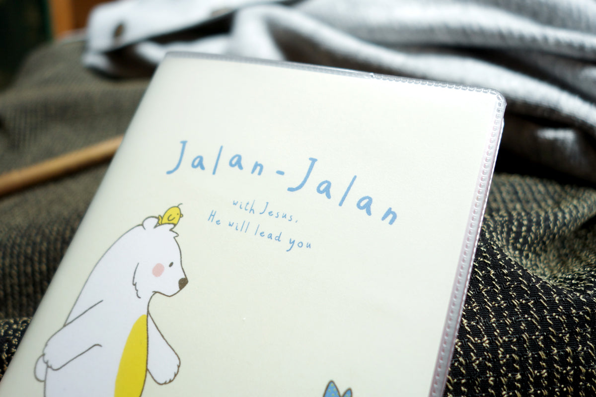 Jalan-Jalan With Jesus passport cover featuring the message “He will lead you”.