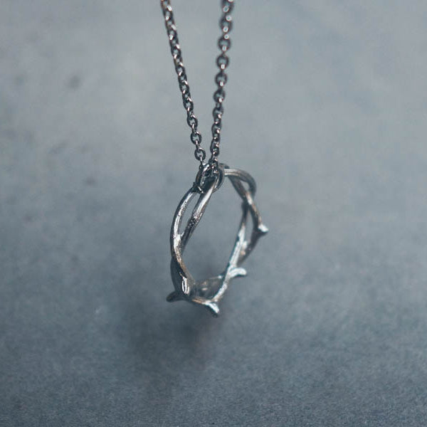 Unisex Crown of Thorns ring pendant on adjustable chain.