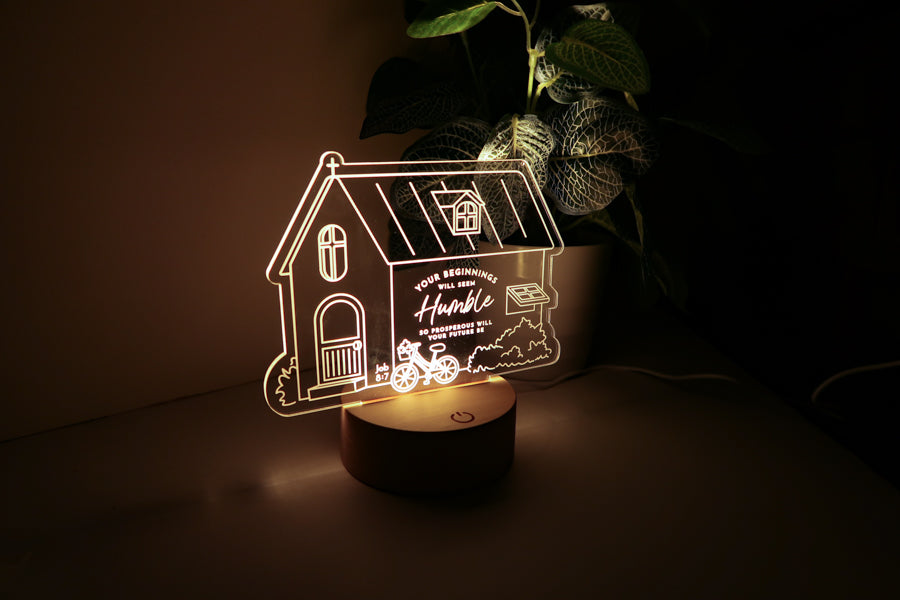 Your Beginnings Will Seem Humble night light on a wooden base