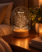 Blessed Rather Are Those Who Hear Christian night light glowing on a warm bedside table