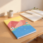 Come To Me A5 Christian notebook on a warm sunlit wooden desk with journalling essentials