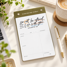 Word Before Works 90-Day Christian notepad in Field of Grace green styled on a bright desk with coffee and stationery