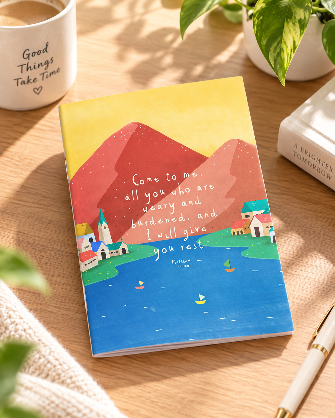 Come To Me and I Will Give You Rest Matthew 11:28 A6 Christian notebook styled on a bright wooden desk