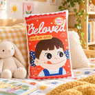 Beloved Milky Candy Christian plush toy styled in a cheerful cosy bedroom with soft toys and warm natural light