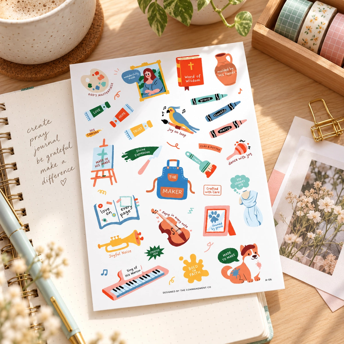 Art Everyday Christian sticker sheet styled on a bright journalling desk with notebook, coffee, washi tape and stationery