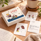 Peace and Joy in Christ mini card set arranged on a warm wooden table
