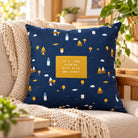 To a Land Flowing with Milk and Honey navy Christian cushion cover on a cream sofa