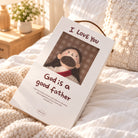 Jesus plushie in white I Love You God Is a Good Father window gift box on a cosy bed.