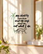 Transparent mirror decal with identity in Christ lettering and leopard illustration on a sunlit mirror