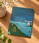 I Have Heard Your Prayer 2 Kings 20:5 card with lighthouse illustration laid on a wooden table