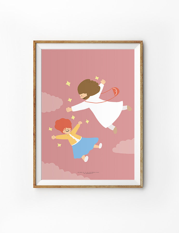 Framed artwork featuring a whimsical illustration of Jesus and a child joyfully floating in the air with a pink background and clouds.