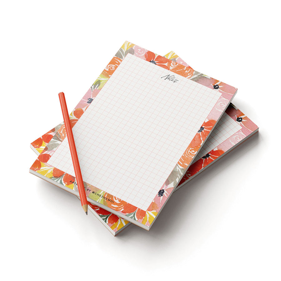 Floral Notepad: Elegant square guides, 50 pages, tear-off ease, with a bonus ballpoint pen.