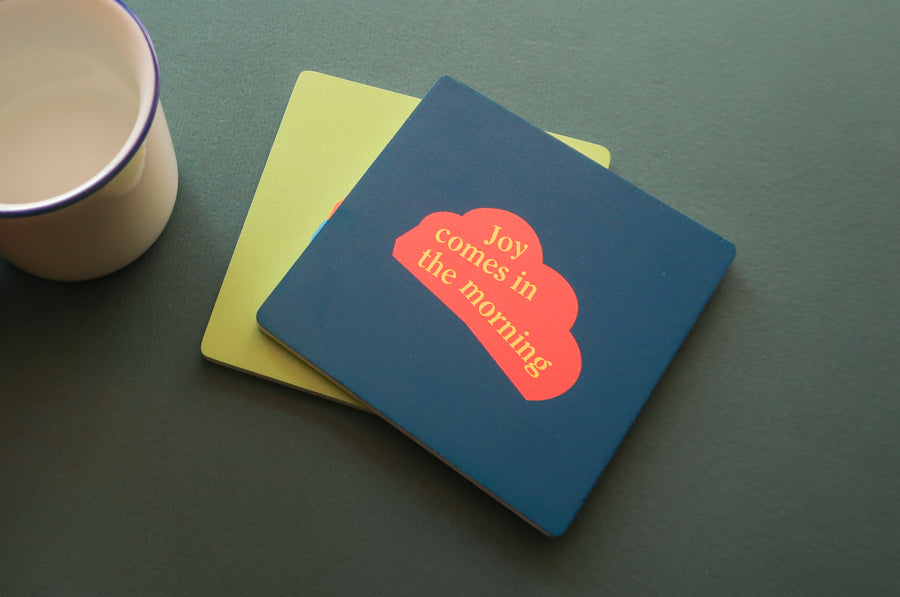 Faithful Geometry Collection: Vibrant wooden square coasters with Christian motifs.