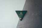Leather button coin pouch styled as a modern gift for fathers.