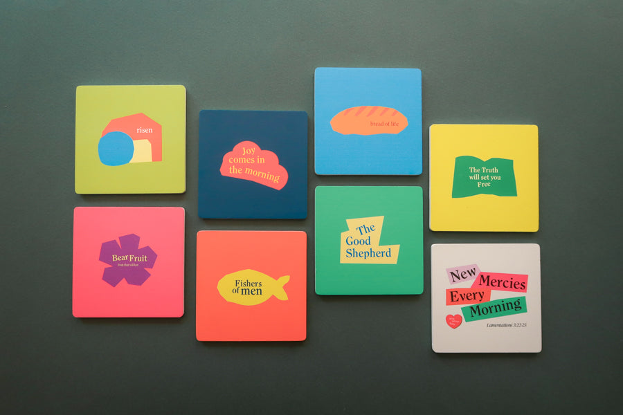 Christianity Collection Coasters: Vibrant wooden square coasters with geometric designs.