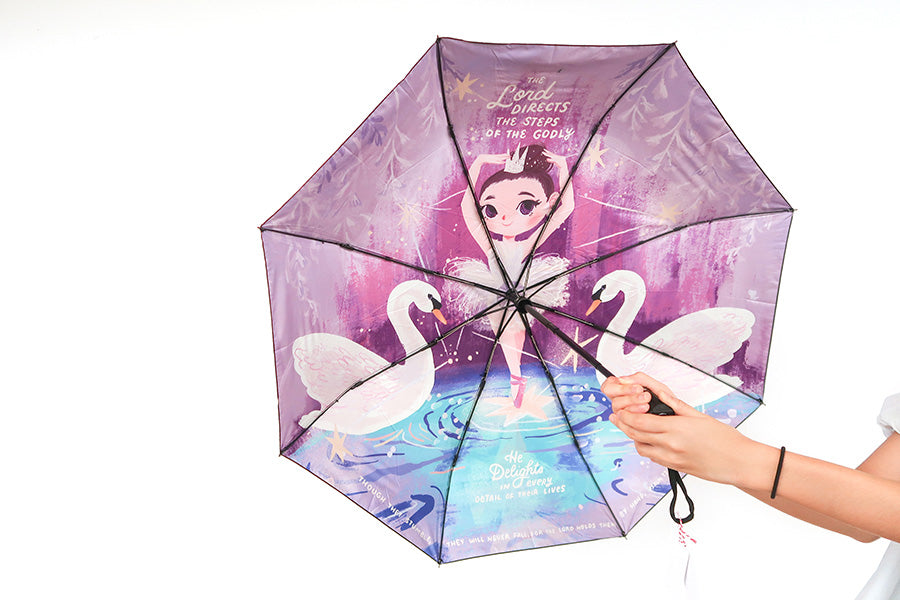 Stylish Christian umbrella featuring a ballerina and 'The Lord directs steps' verse, perfect for gifting.