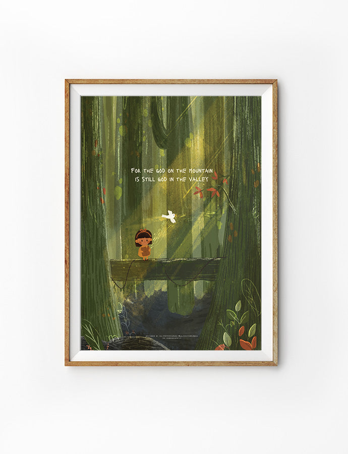 A framed Christian art print featuring a child standing on a wooden bridge in a lush, green forest. The text on the artwork reads, 'For the God on the mountain is still God in the valley,' conveying a message of faith and reassurance.