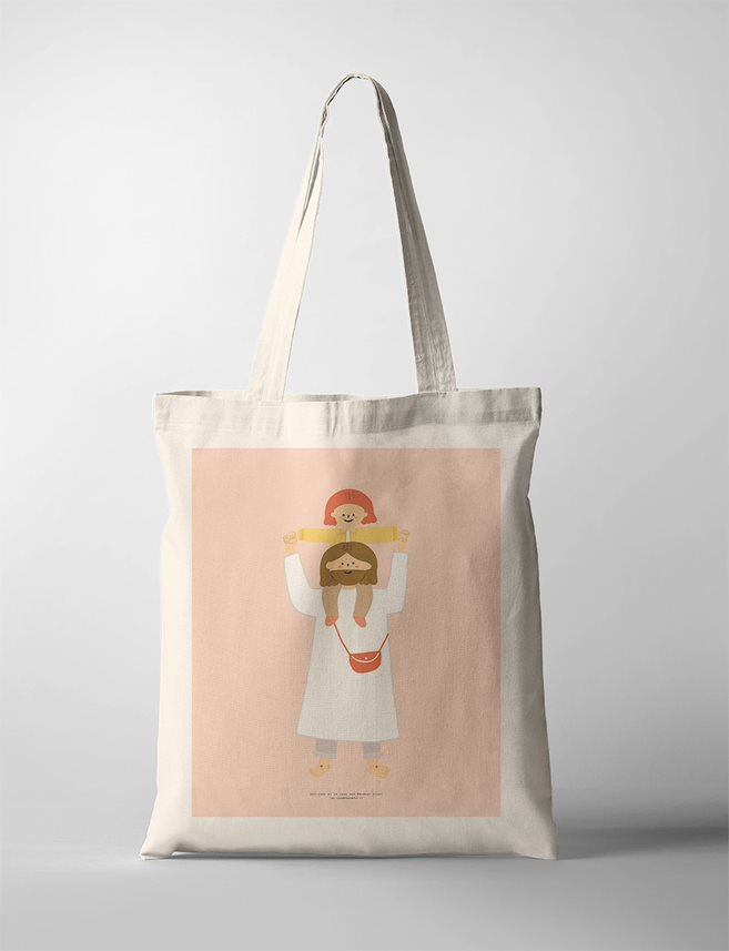 Faith based Tote Bag featuring a minimalist design of Jesus wearing a white robe, set against a soft pink background, framed in light wood. Jesus serene expression and gentle colors contribute to a sense of peace and spirituality. 