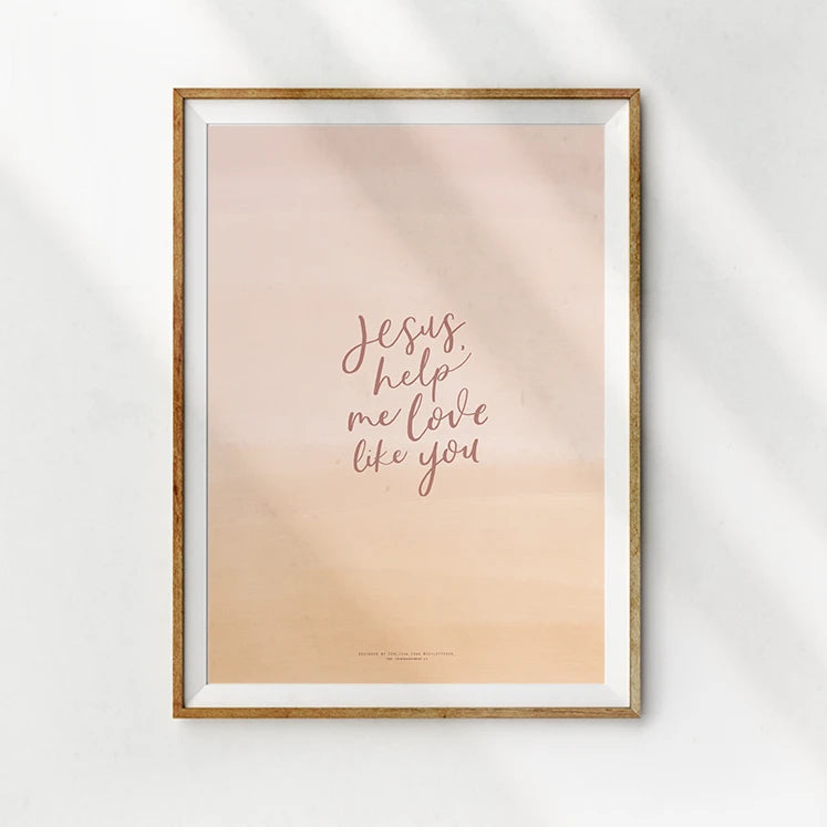 Elegant wall art with the text 'Jesus, help me love like you' in modern calligraphy on a peach gradient background