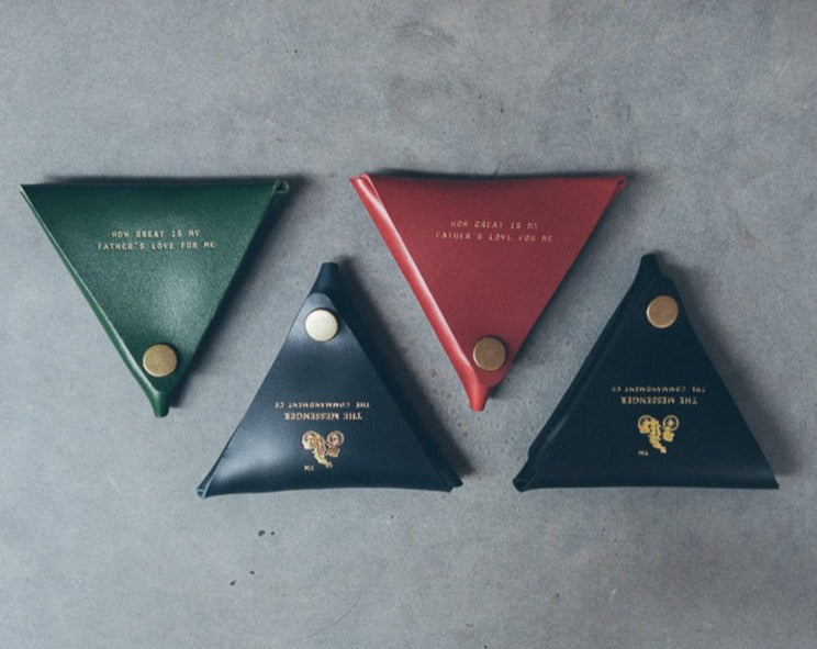 Leather coin pouch by The Messenger by TCCO shown in a product close-up.