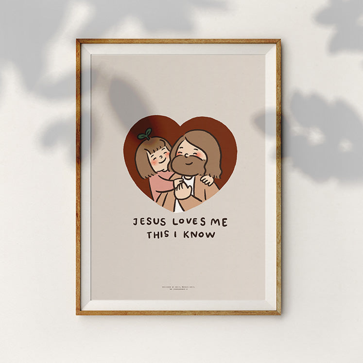 Framed artwork depicting Jesus with a joyful child in a heart, symbolizing love and faith with the words 'Jesus Loves Me This I Know.'