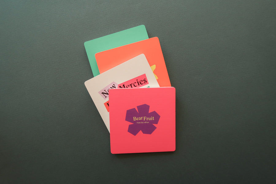 Heavenly Coaster: Vibrant wooden coaster featuring simple Christian design