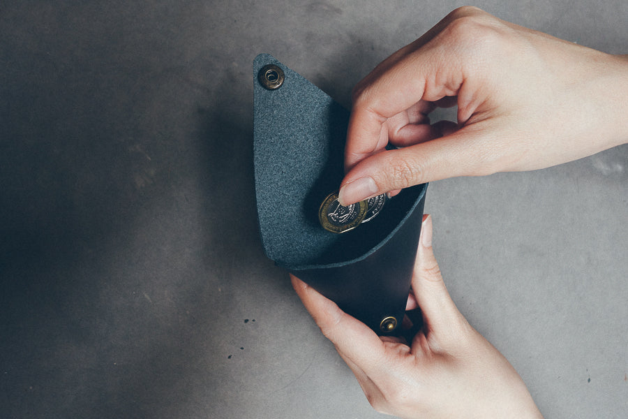 Genuine-leather coin pouch styled as a practical Christian gift for men.